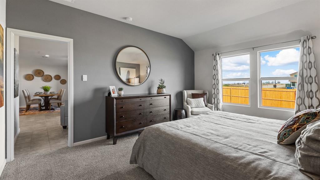 320 Blanco Drive Azle, TX 76020 - Photo 20 of 40 a bedroom with a bed and a large window