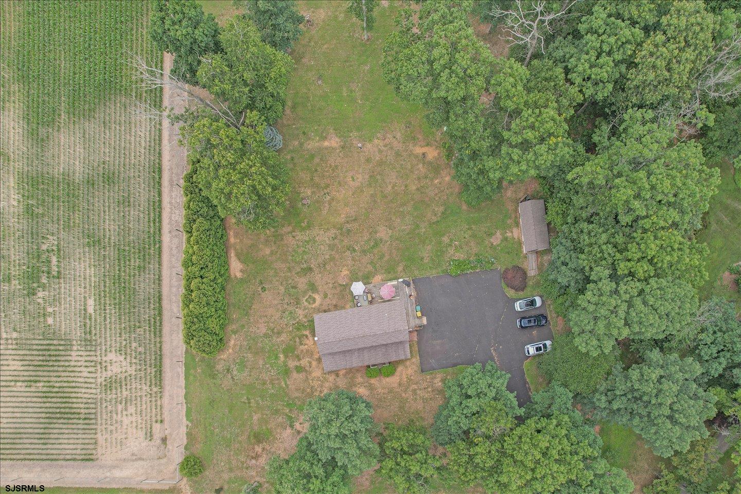 419 Crow Pond Road Elmer, NJ 08318 - Photo 54 of 60 an aerial view of a house with a yard