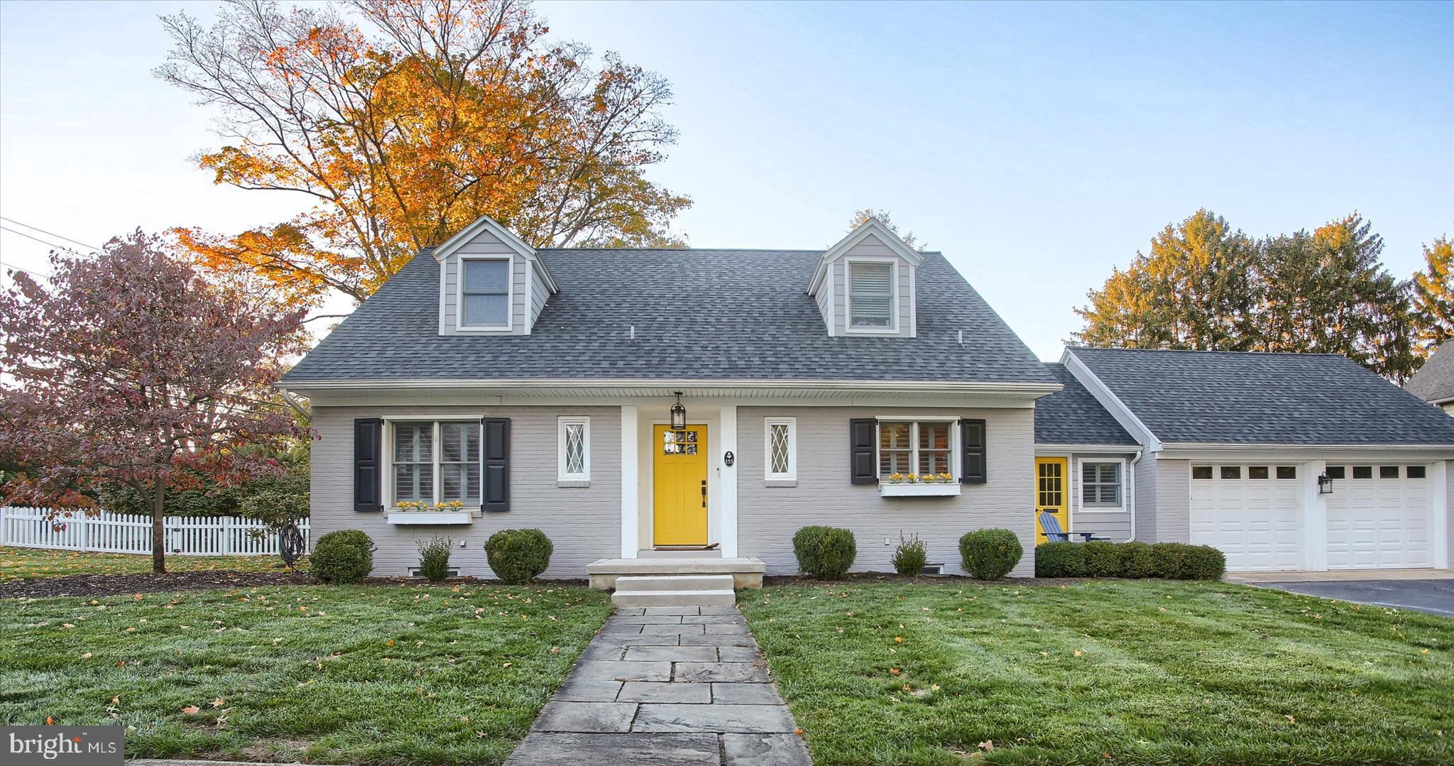 155 Oak Lane Hershey, PA 17033 - Photo 1 of 54 a front view of a house with a yard