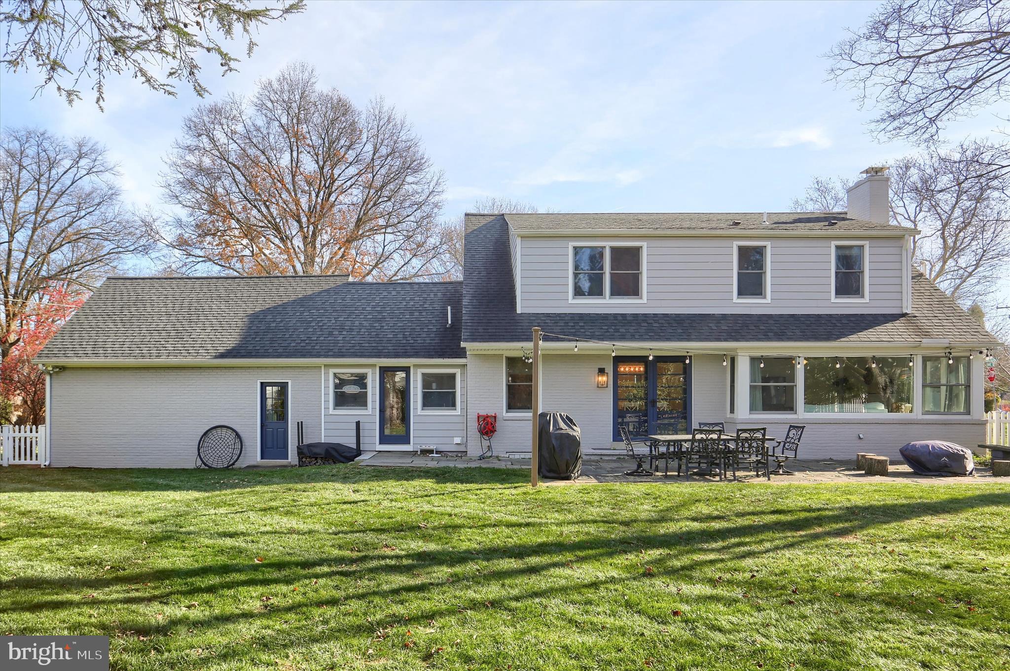 155 Oak Lane Hershey, PA 17033 - Photo 37 of 54 a front view of a house with a garden and plants