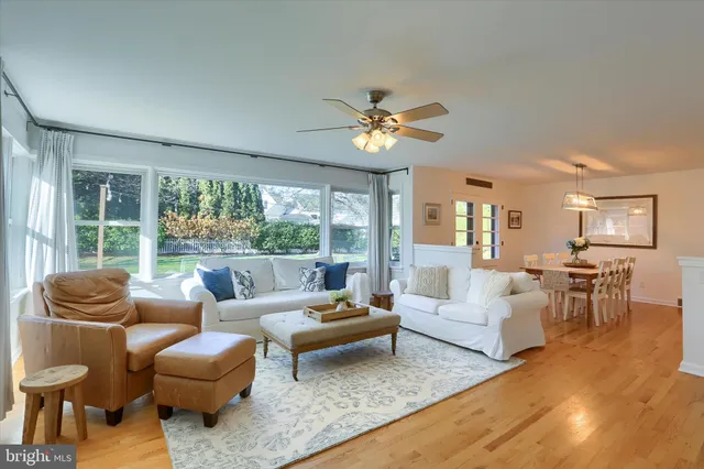 a bathroom with a sink toilet and a mirror
