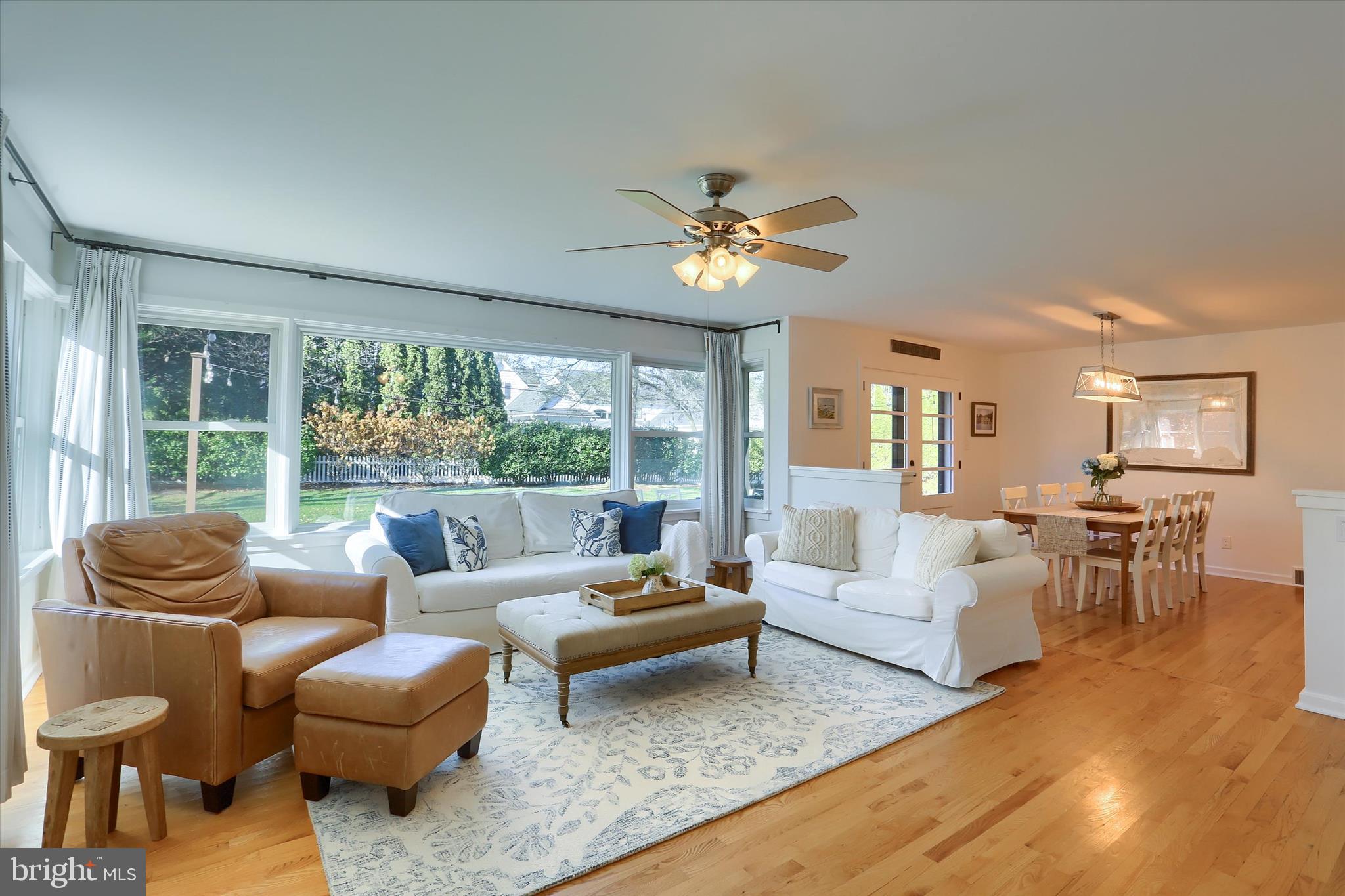 155 Oak Lane Hershey, PA 17033 - Photo 5 of 54 a living room with furniture potted plant and a large window