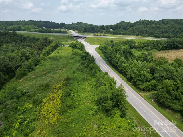 a view of a garden with a pathway
