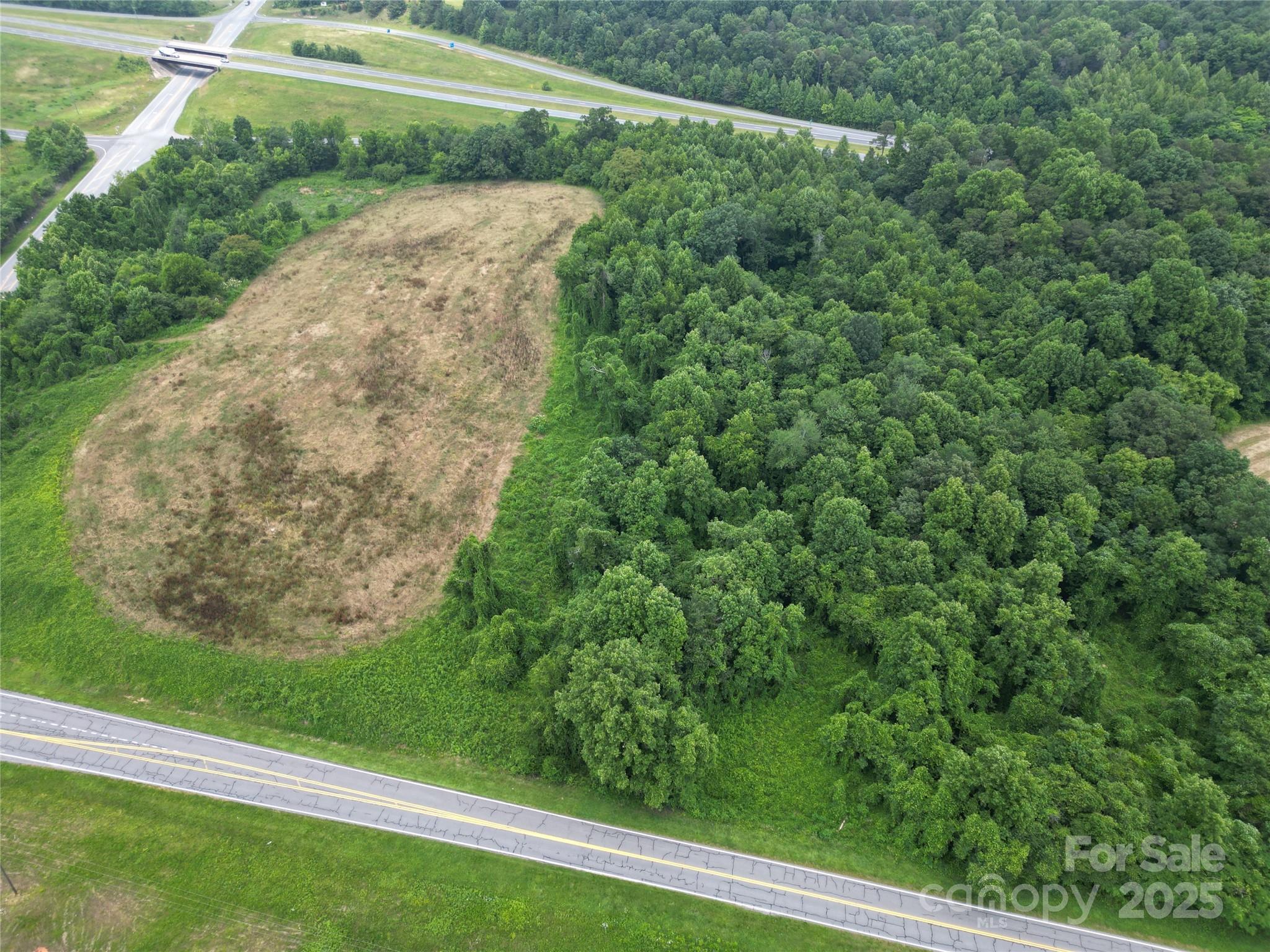 0 Clingman Road Ronda, NC 28670 - Photo 14 of 18 a view of a garden with a pathway