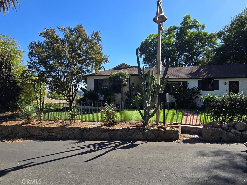 a view of a street with houses and street view