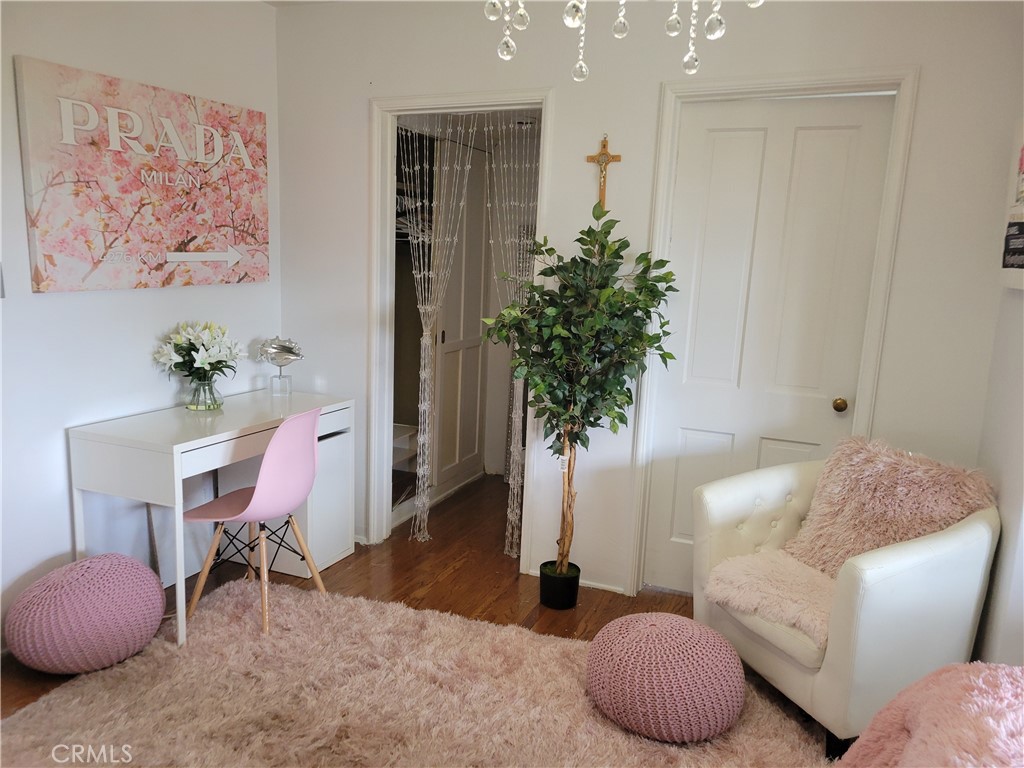 4600 9th Street Riverside, CA 92501 - Photo 12 of 21 a living room with furniture and a potted plant