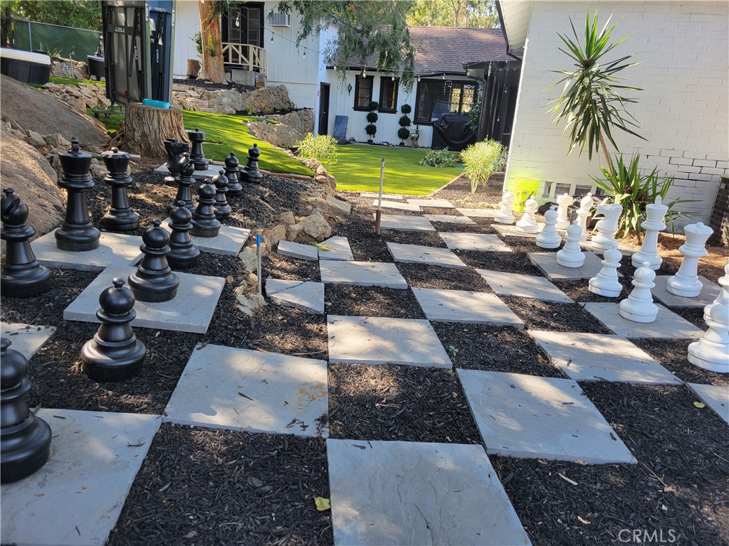 4600 9th Street Riverside, CA 92501 - Photo 17 of 21 a view of a swimming pool with a patio and plants