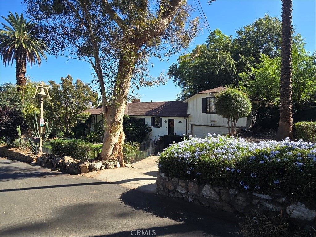 4600 9th Street Riverside, CA 92501 - Photo 5 of 21 a front view of a house with garden
