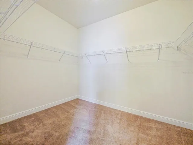 a view of a room with racks on the wall