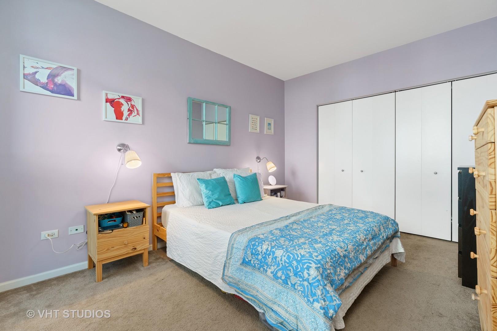 1255 South State Street, Unit 1809 Chicago, IL 60605 - Photo 6 of 11 a bedroom with a bed and a night stand