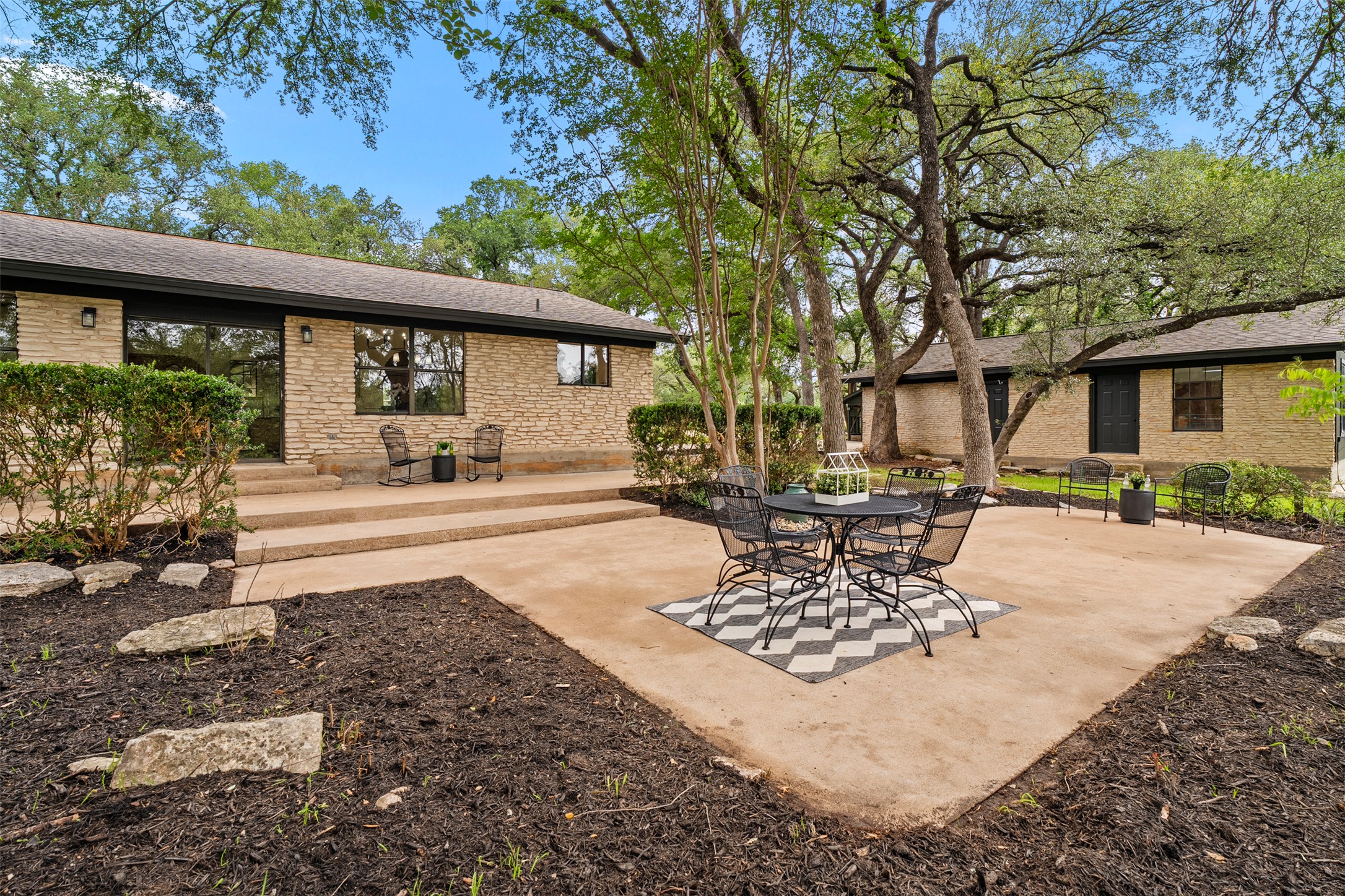 303 West Sequoia Spur Georgetown, TX 78628 - Photo 24 of 34 a front view of a house with garden