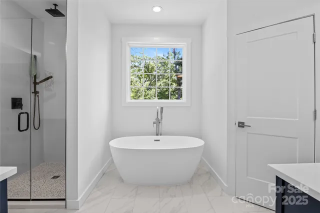 a bathroom with a sink and shower