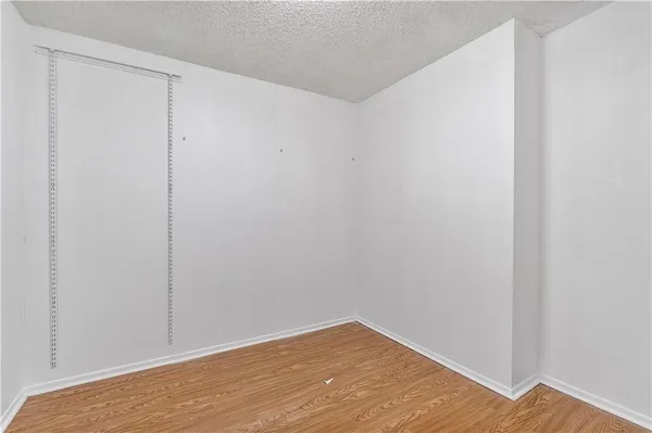 a view of small space with wooden floor