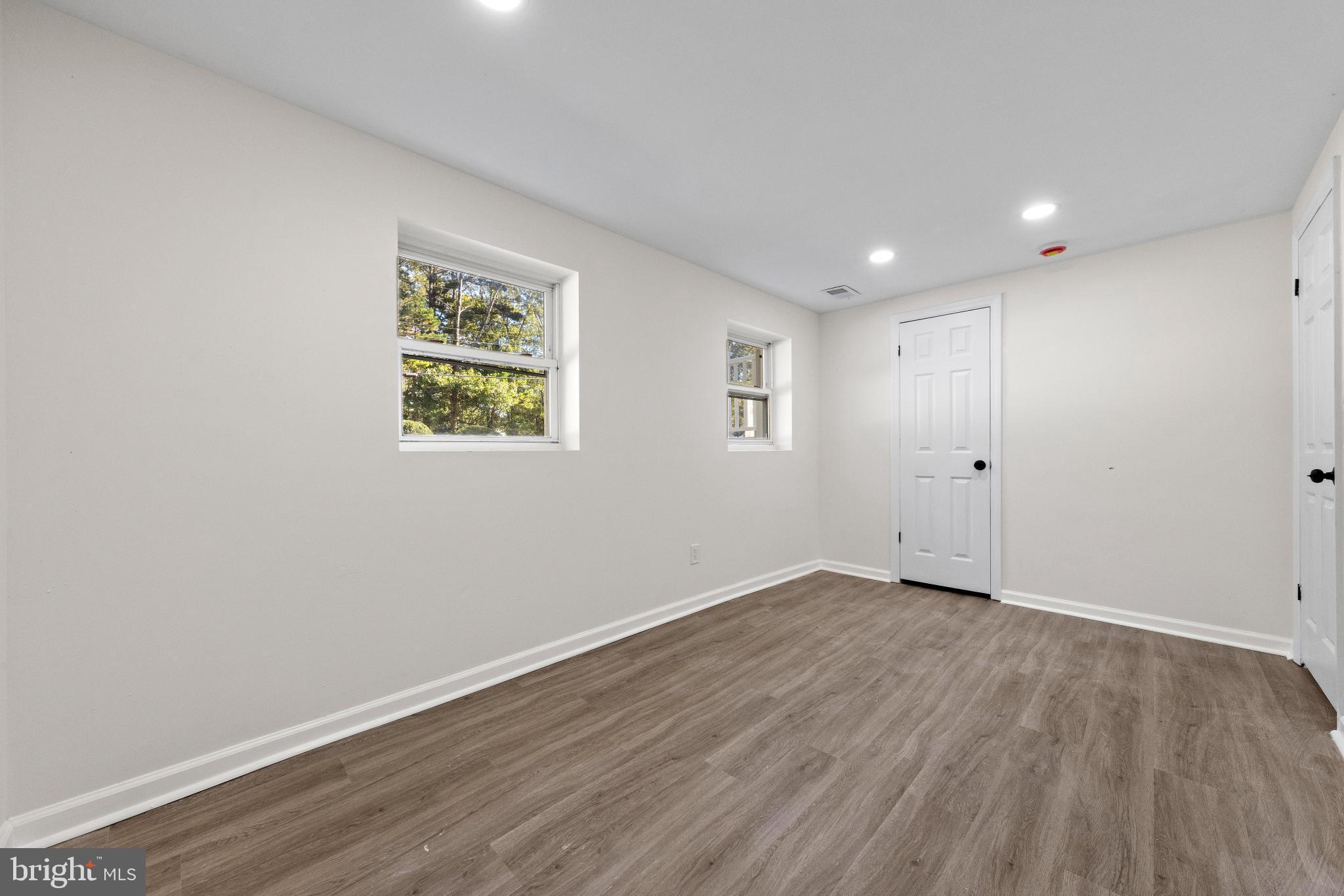 716 6th Road Newtonville, NJ 08346 - Photo 22 of 43 a view of room with wooden floor and window