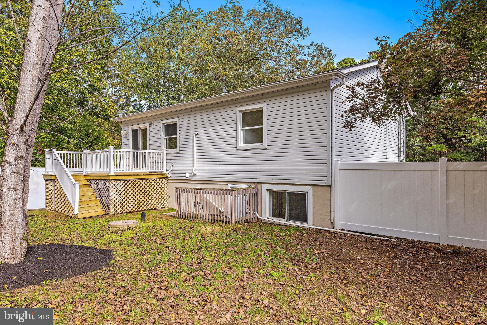716 6th Road Newtonville, NJ 08346 - Photo 37 of 43 a front view of a house with garden