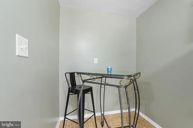 a view of a room with rack and wooden floor
