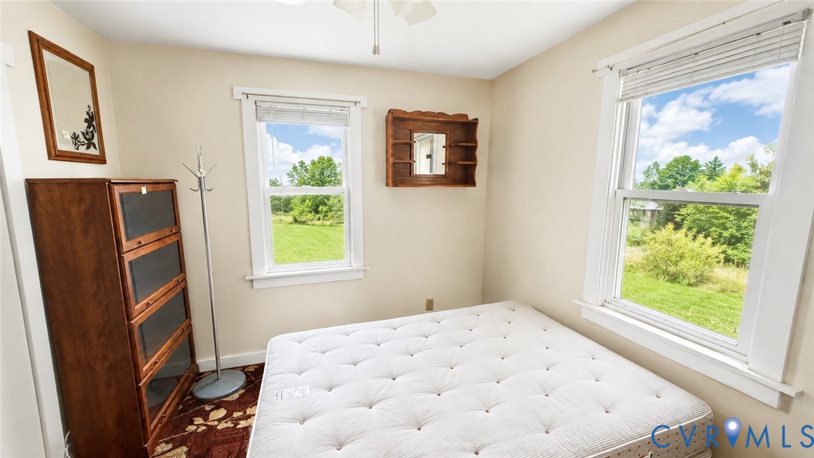 5560 West Hoover Road Reva, VA 22735 - Photo 26 of 32 Room featuring two windows with white trim, offeri
