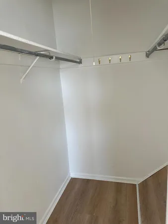 a view of an empty walk in closet