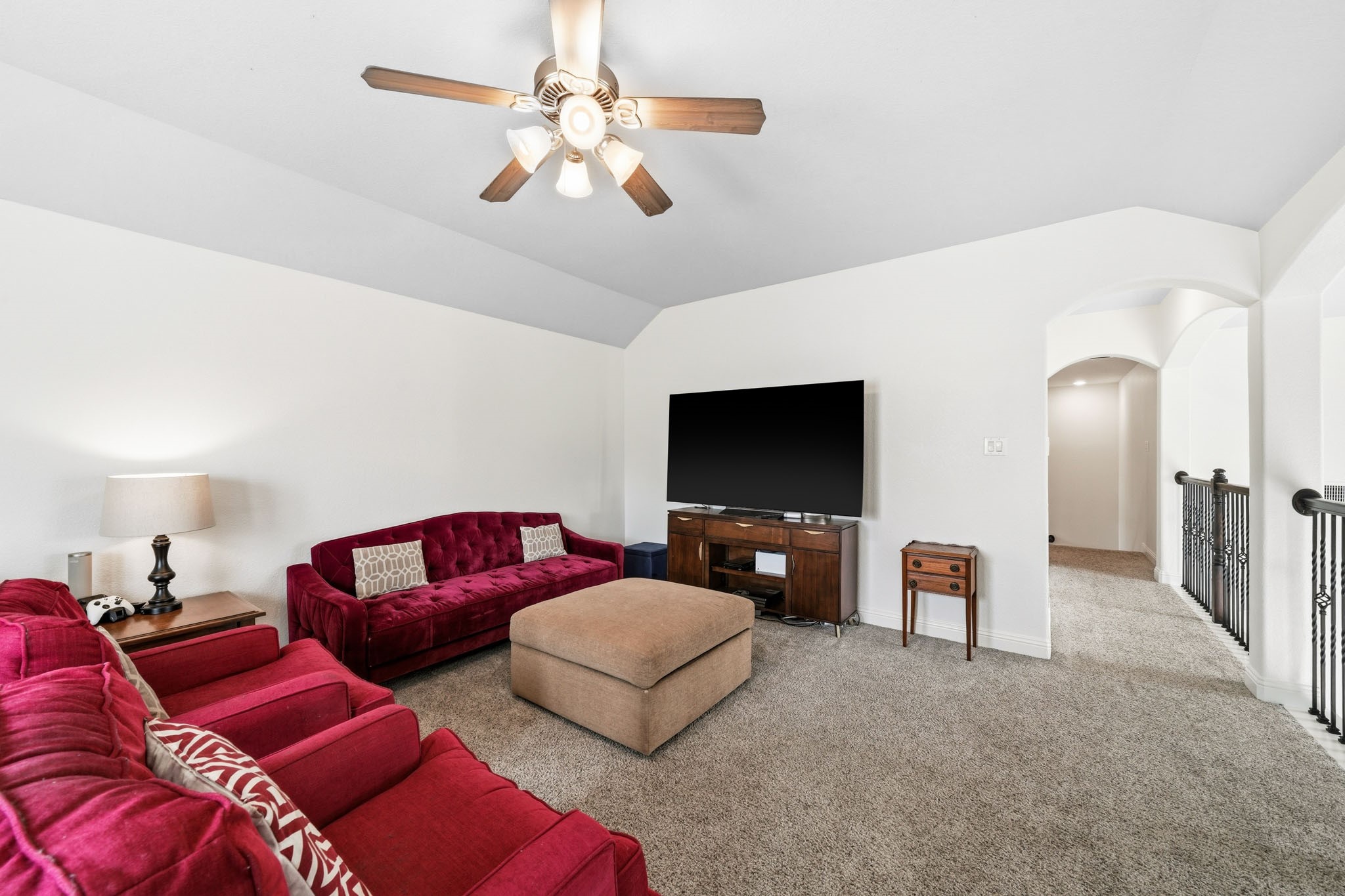 17610 Strackfield Lane Tomball, TX 77377 - Photo 34 of 50 Whether hosting game day celebrations or enjoying a quiet evening with family, this game room is designed to bring everyone together in comfort and style.