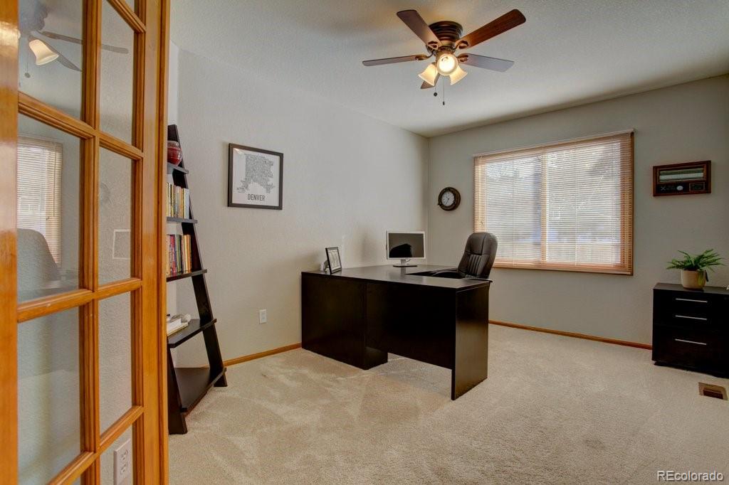 2364 Stratford Court Highlands Ranch, CO 80126 - Photo 5 of 35 a living room with furniture and a window