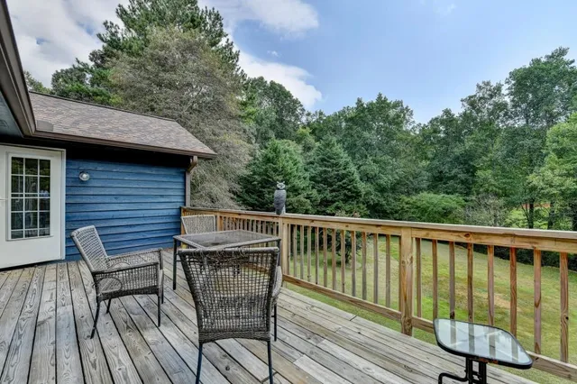 a view of a yard with a tree