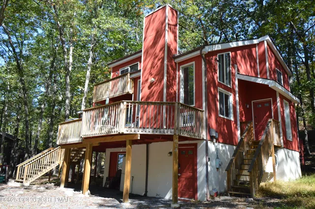 a view of a house with a street