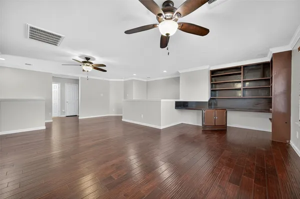 a view of entryway with wooden floor
