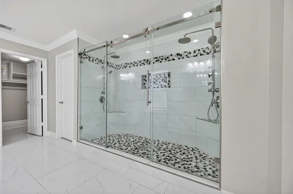 a view of an empty room with a bathroom