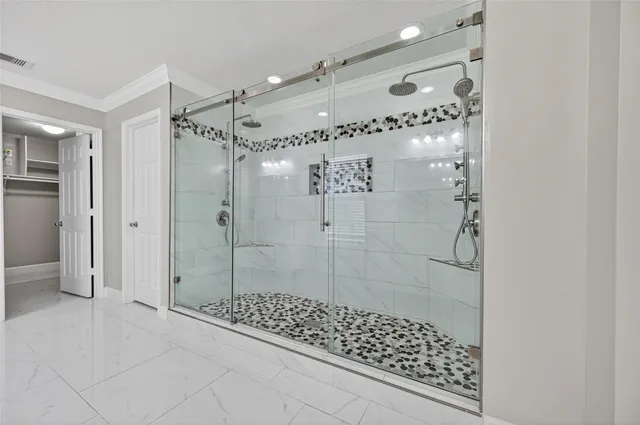 a view of an empty room with a bathroom