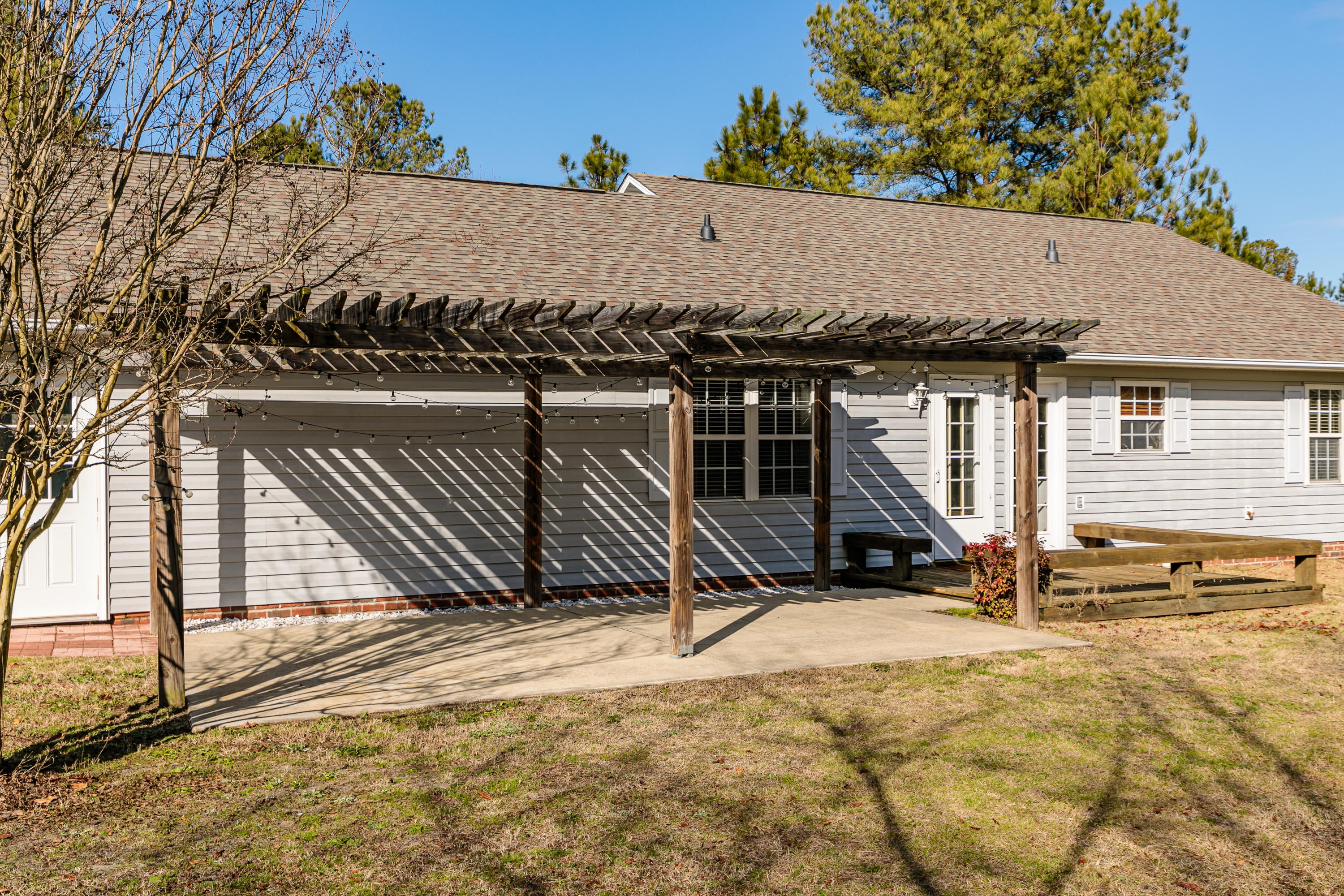 887 Roseland Road Aberdeen, NC 28315 - Photo 22 of 27 Pergola/Concrete Patio