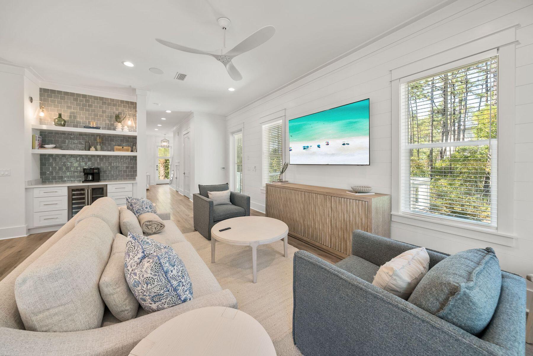 23 Sweet Gum Loop Inlet Beach Inlet Beach, FL 32461 - Photo 11 of 35 a living room with furniture and a large window