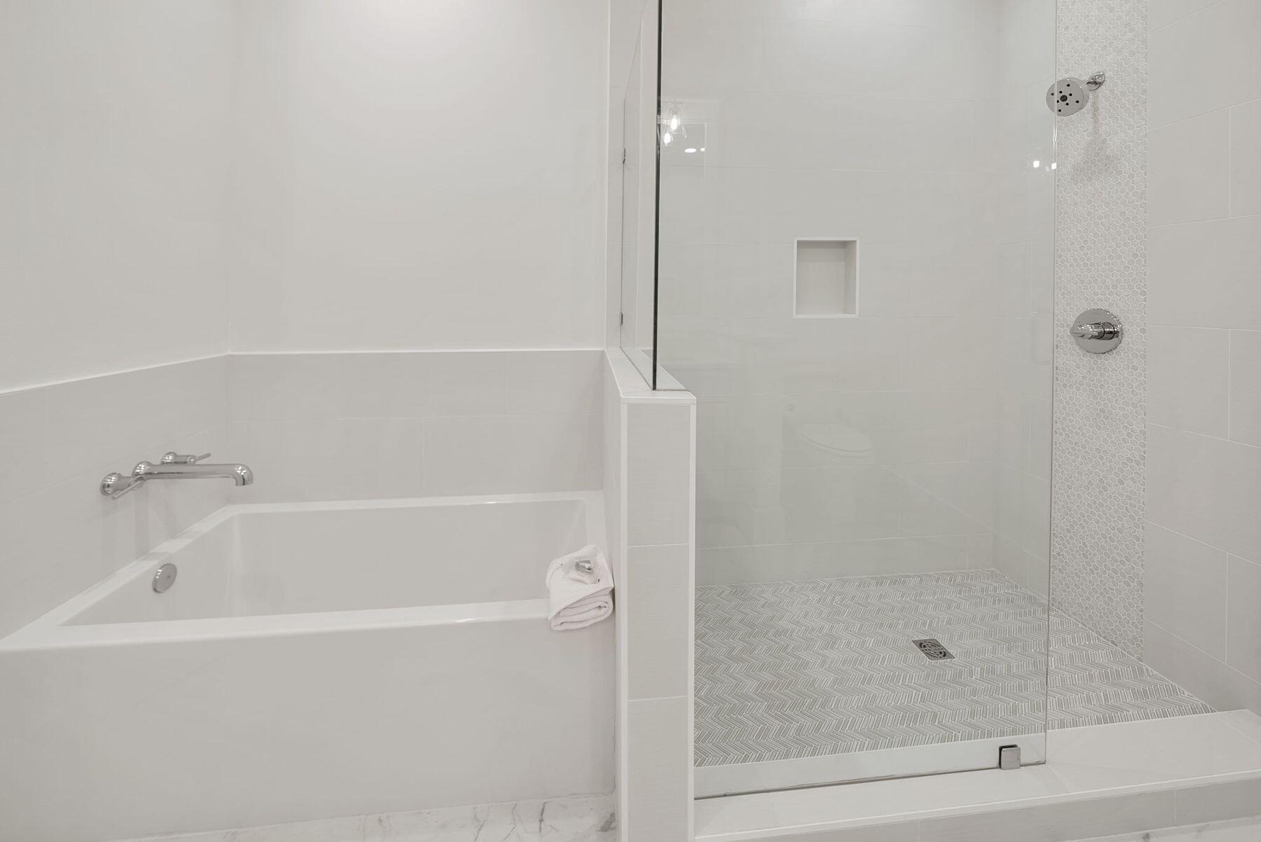 23 Sweet Gum Loop Inlet Beach Inlet Beach, FL 32461 - Photo 16 of 35 a white bath tub sitting next to a shower