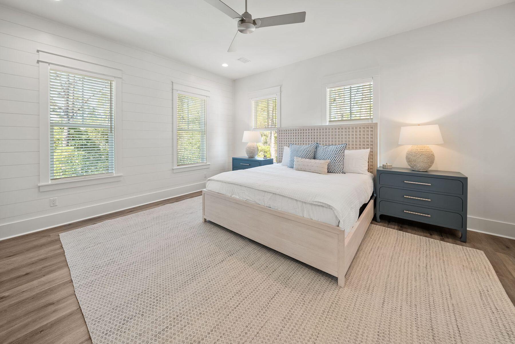 23 Sweet Gum Loop Inlet Beach Inlet Beach, FL 32461 - Photo 18 of 35 a spacious bedroom with a bed and window