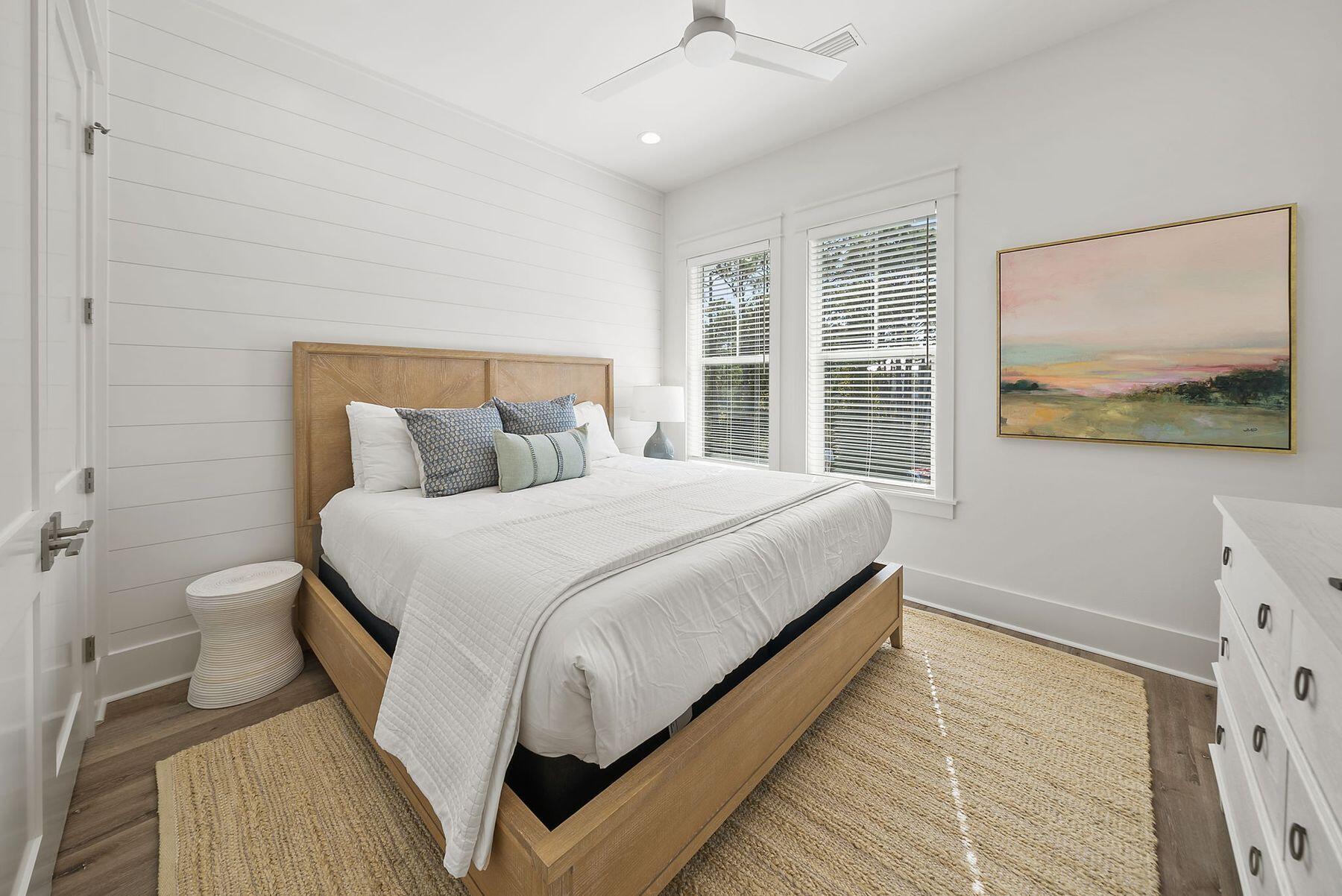 23 Sweet Gum Loop Inlet Beach Inlet Beach, FL 32461 - Photo 24 of 35 a bedroom with a bed and a flat screen tv