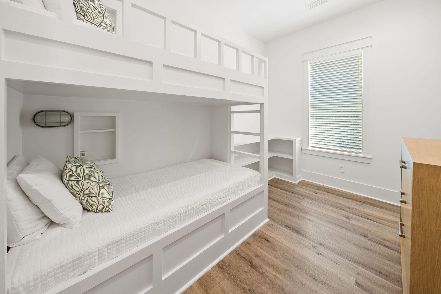 23 Sweet Gum Loop Inlet Beach Inlet Beach, FL 32461 - Photo 27 of 35 a bedroom with a bed and window