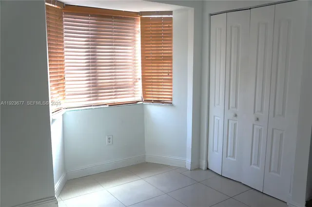 an empty room with a window