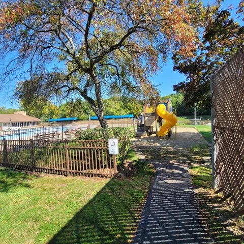 a view of a yard with a slide