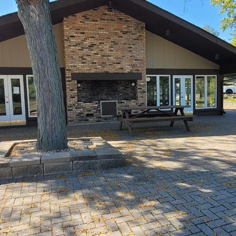 a view of swimming pool with outdoor seating