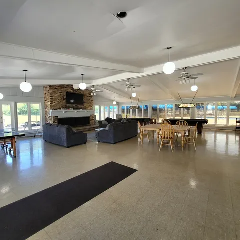 a kitchen with lots of counter top space and a dining table
