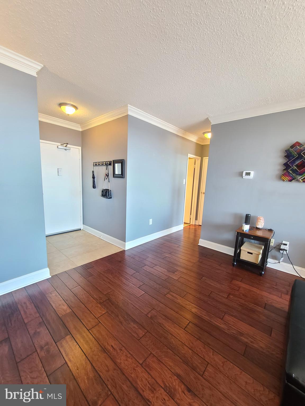 4141 North Henderson Road, Unit 801 Arlington, VA 22203 - Photo 20 of 65 Bathroom & bedroom are on the left of foyer