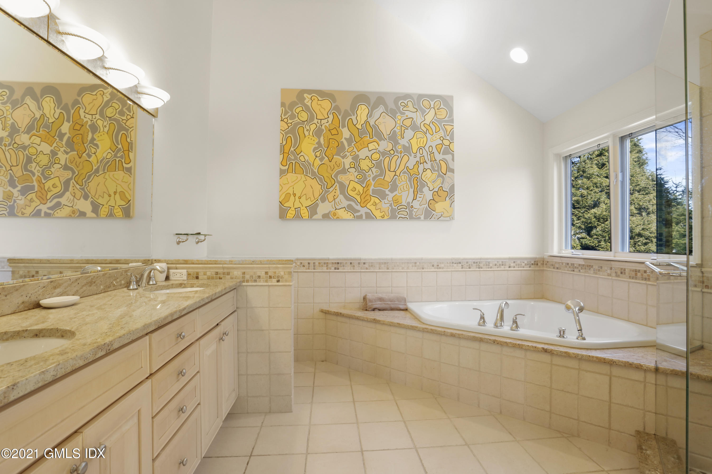 3 Old Wagon Road Old Greenwich, CT 06870 - Photo 14 of 37 a bathroom with a sink and a bathtub