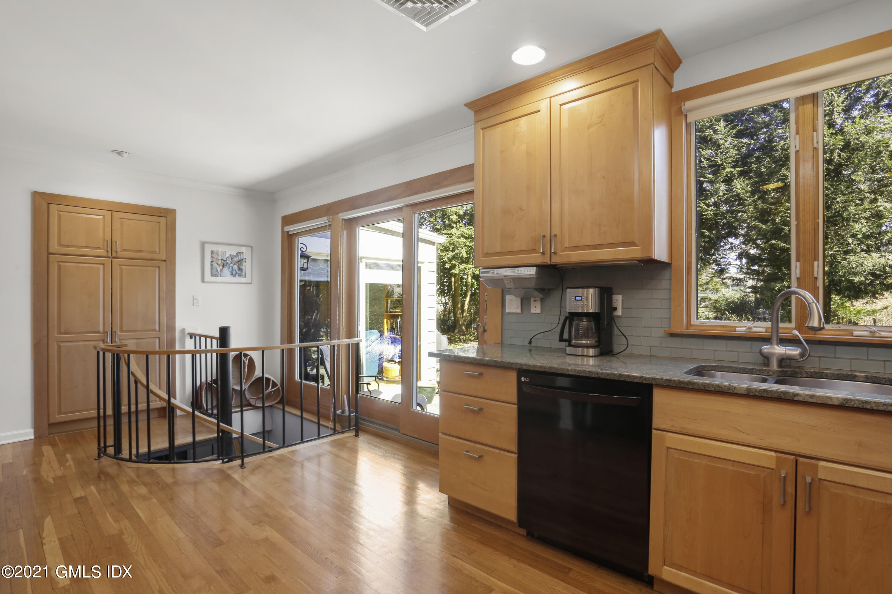 3 Old Wagon Road Old Greenwich, CT 06870 - Photo 6 of 37 a kitchen with stainless steel appliances granite countertop a stove a sink and a microwave