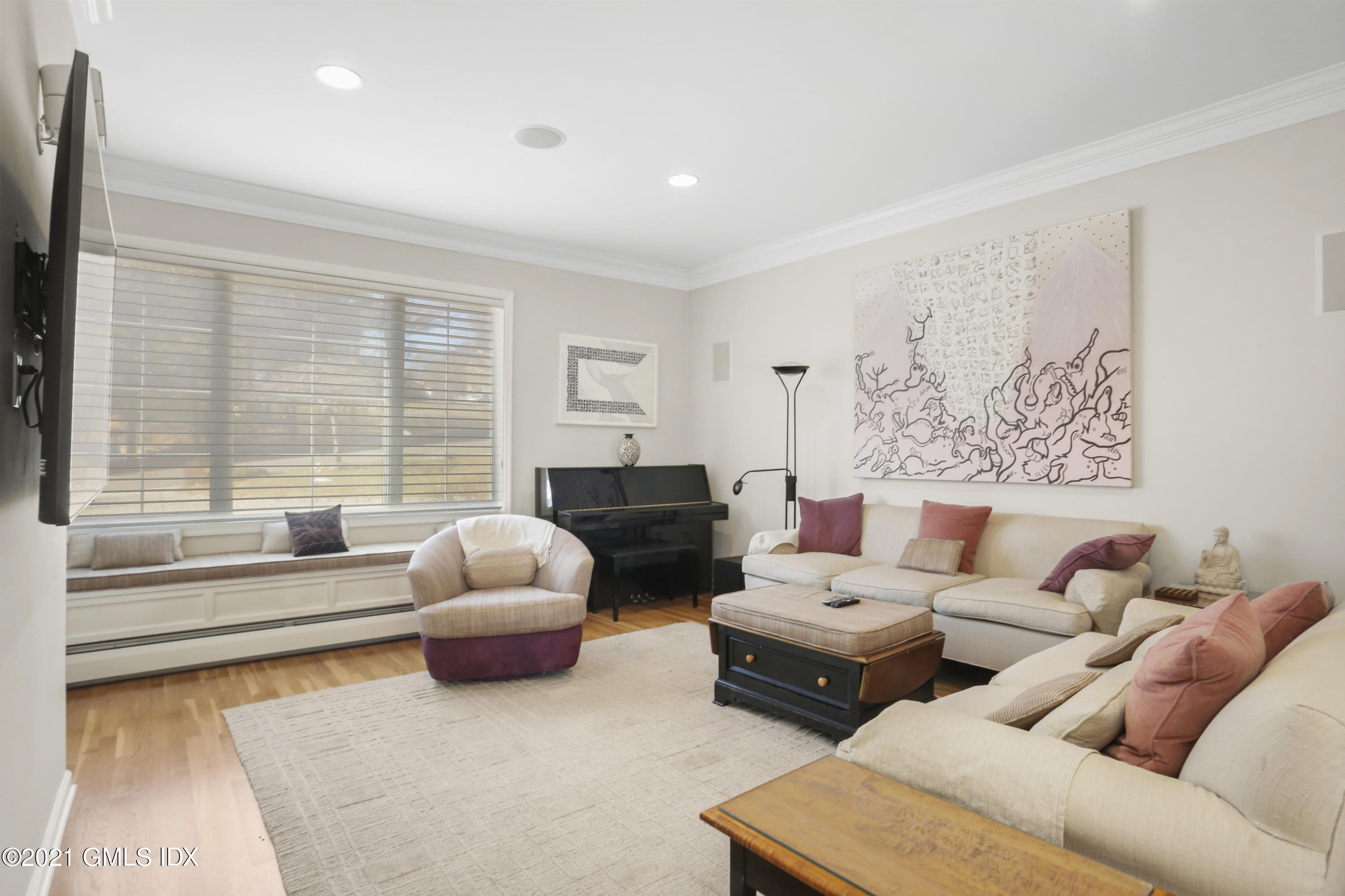 3 Old Wagon Road Old Greenwich, CT 06870 - Photo 7 of 37 a living room with furniture and a large window