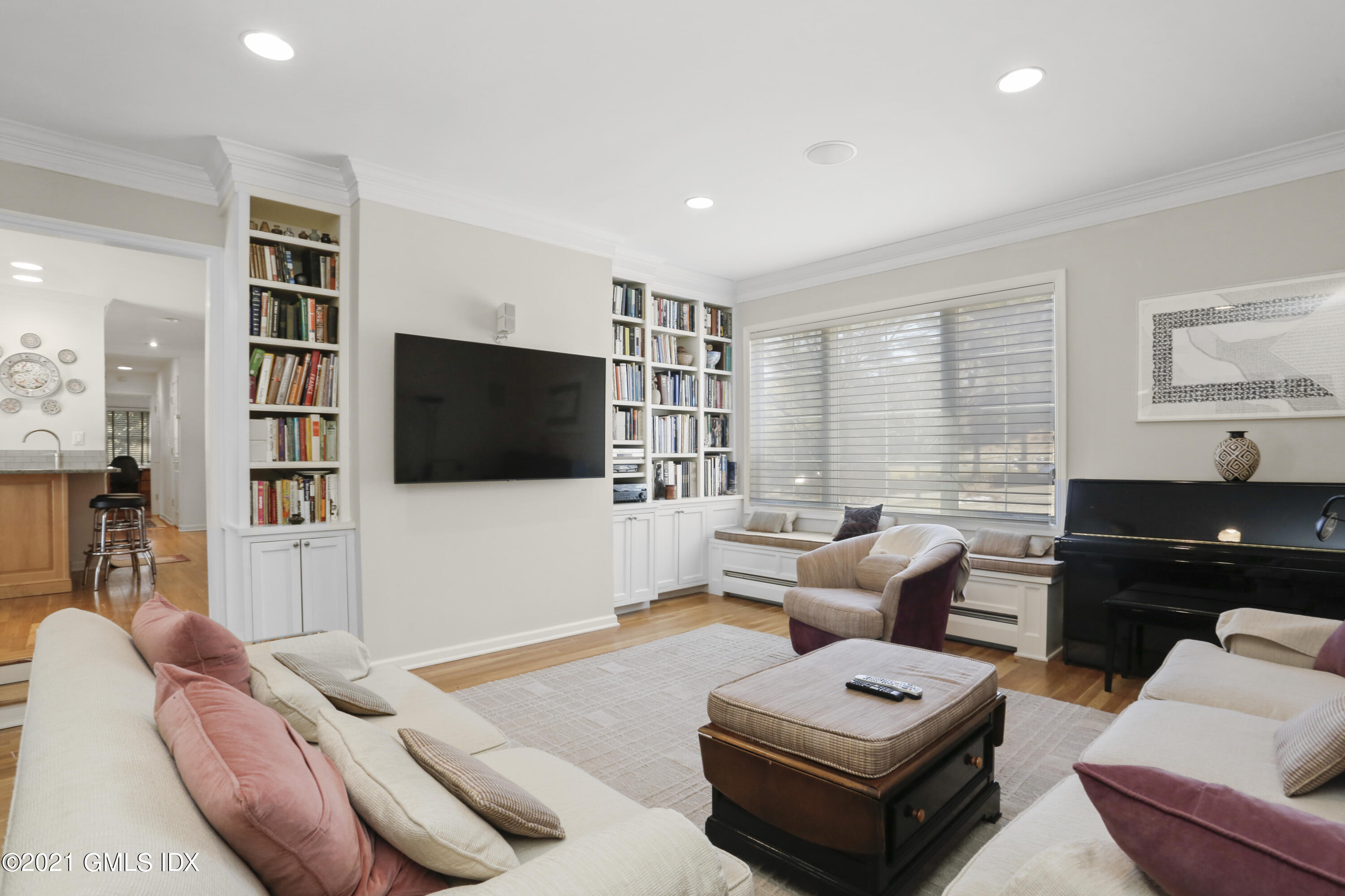 3 Old Wagon Road Old Greenwich, CT 06870 - Photo 8 of 37 a living room with furniture and a flat screen tv