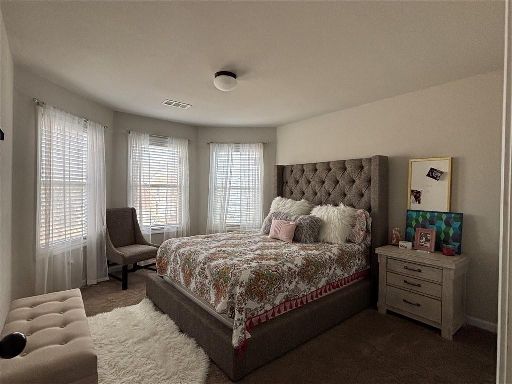 3459 In Bloom Way Auburn, GA 30011 - Photo 22 of 35 a bedroom with a bed chair and window