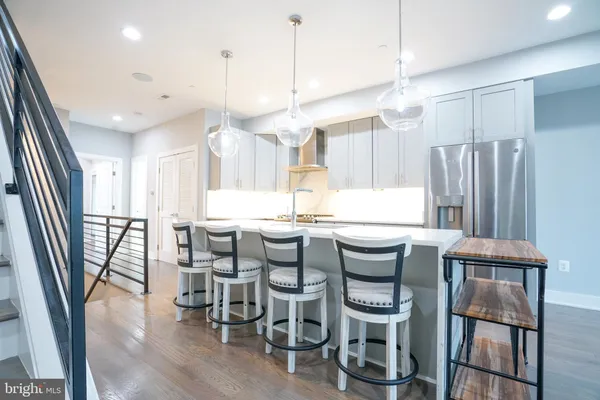 a bathroom with a sink and a shower
