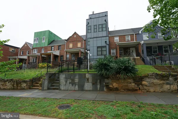 a view of building with yard