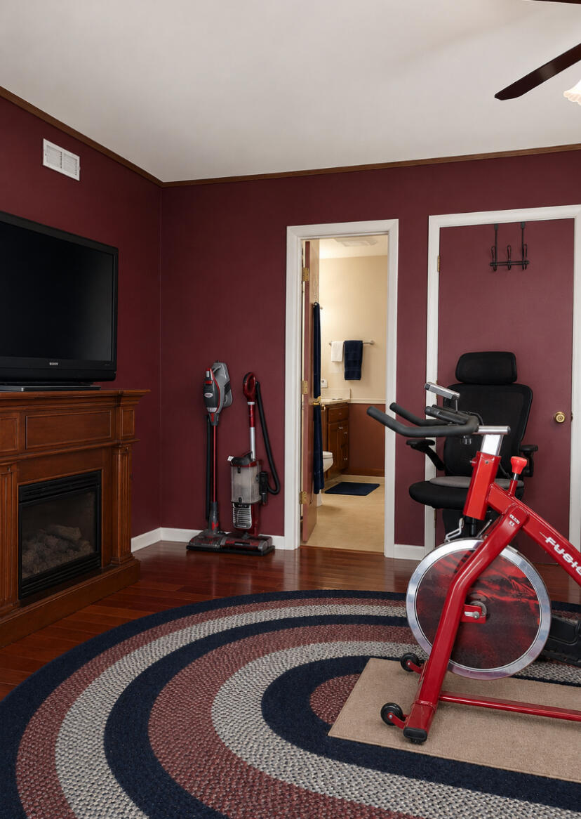 118 Minter Drive Griffith, IN 46319 - Photo 13 of 22 a living room with furniture and a fireplace