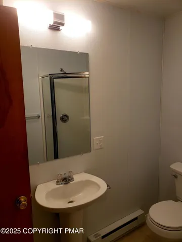 a bathroom with a sink and a toilet