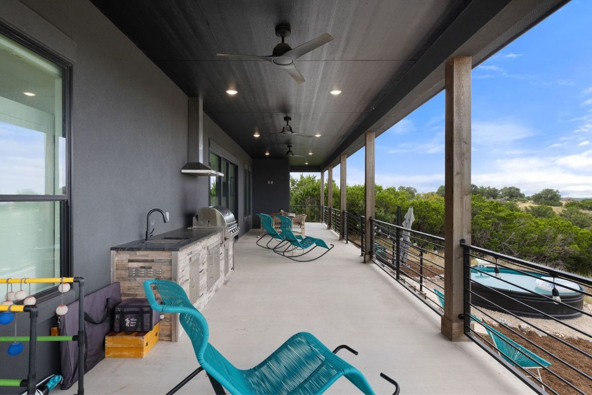 11 Sacramento Boerne, TX 78006 - Photo 13 of 40 View of patio / terrace with a ceiling fan and an outdoor kitchen